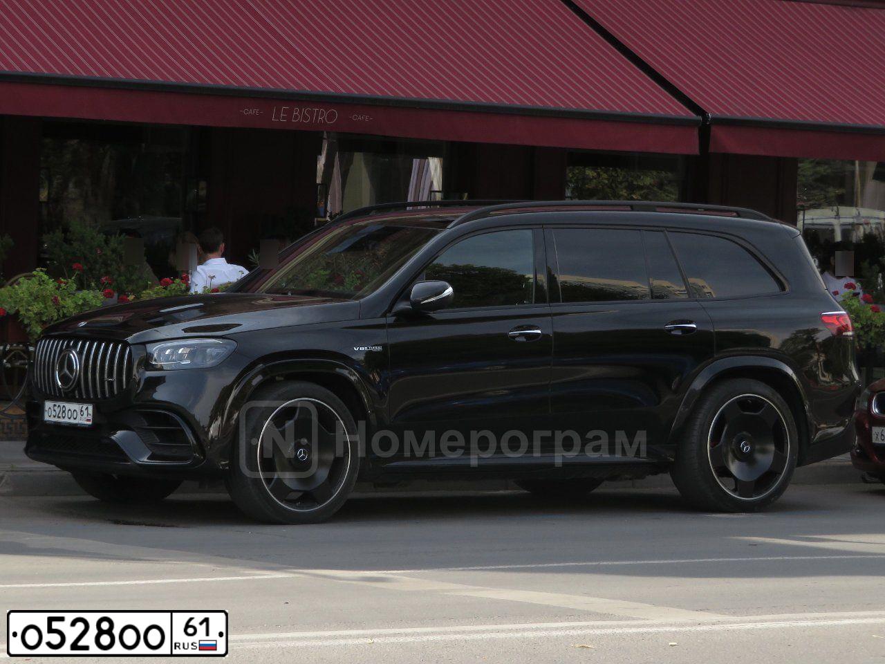Фото автомобиля PORSCHE CAYENNE, 2011 — госномер О528ОО61. Цвет: ФИОЛЕТОВЫЙ