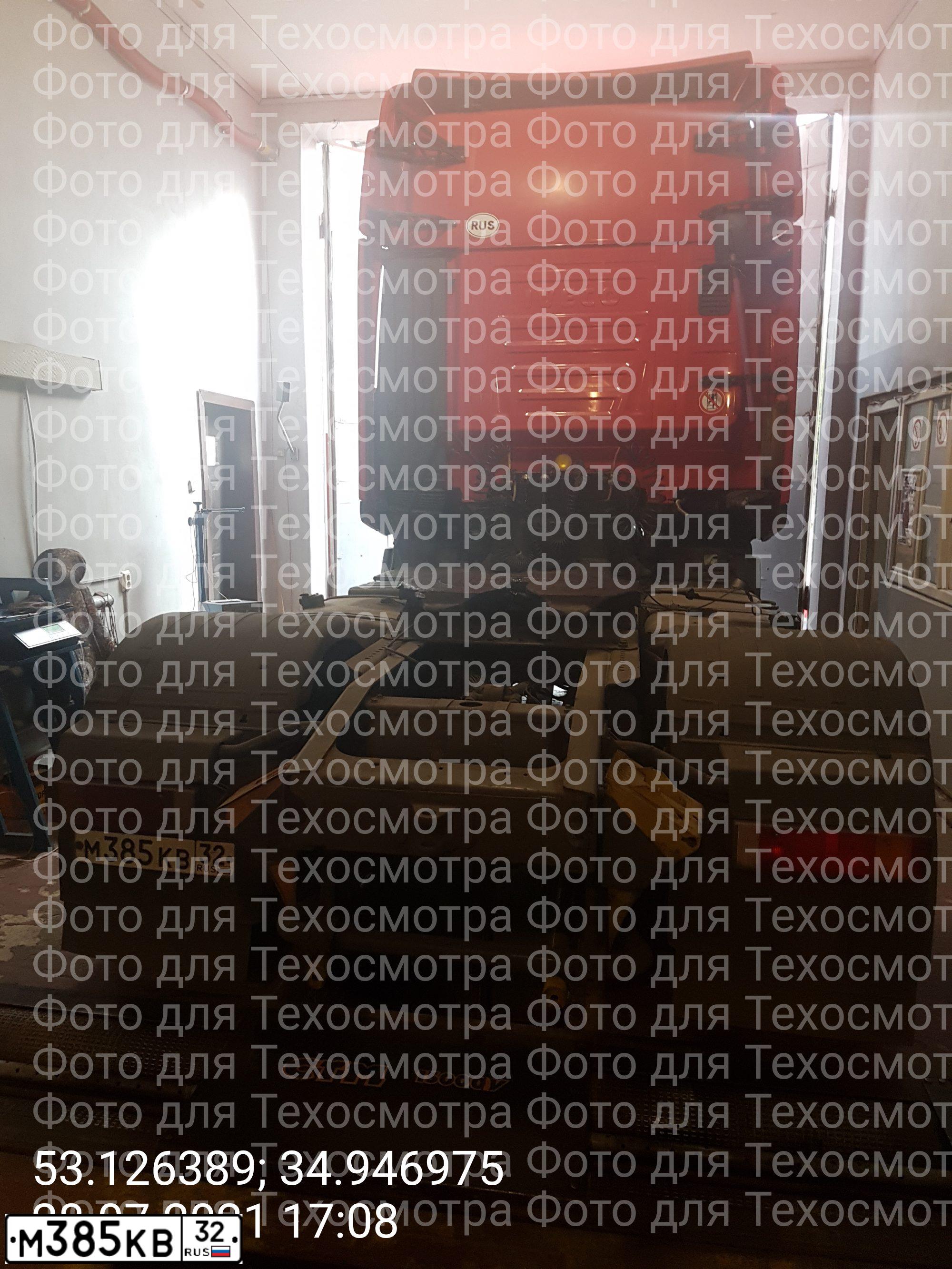 Фото автомобиля IVECO STRALIS, 2012 — госномер М385КВ32. Цвет: Красный