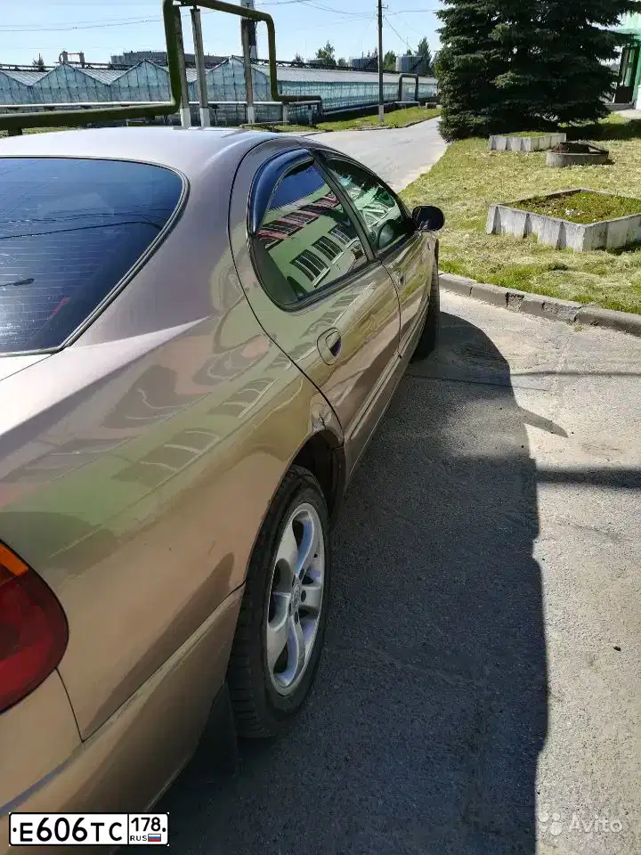 Фото автомобиля CHRYSLER R SERIE 300, 2000 — госномер Е606ТС178. Цвет: СВЕТЛО-КОРИЧНЕВЫЙ