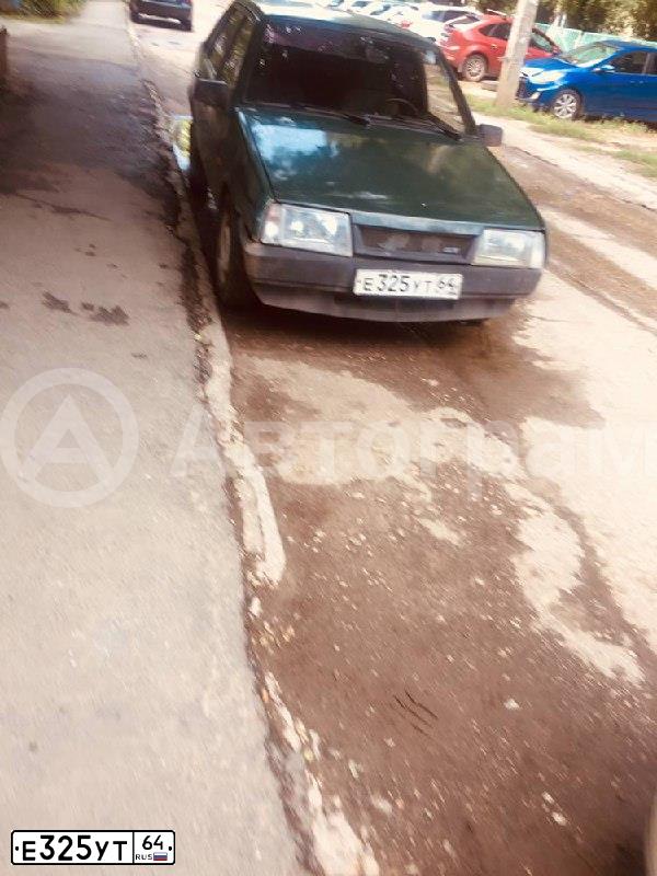 Фото автомобиля LADA 2109 SAMARA, 1996 — госномер Е325УТ64. Цвет: ЗЕЛЕНЫЙ