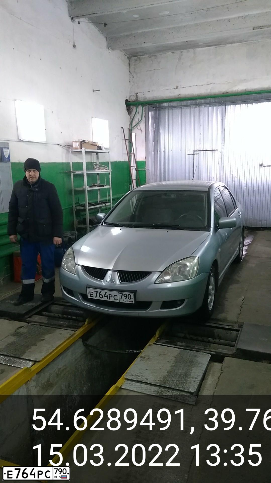 Фото автомобиля MITSUBISHI LANCER, 2004 — госномер Х109ТР62. Цвет: Серебристый