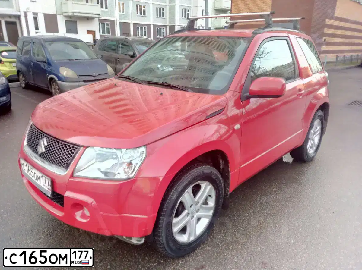 Фото автомобиля SUZUKI /GRAND/ VITARA, 2006 — госномер С165ОМ177. Цвет: Красный