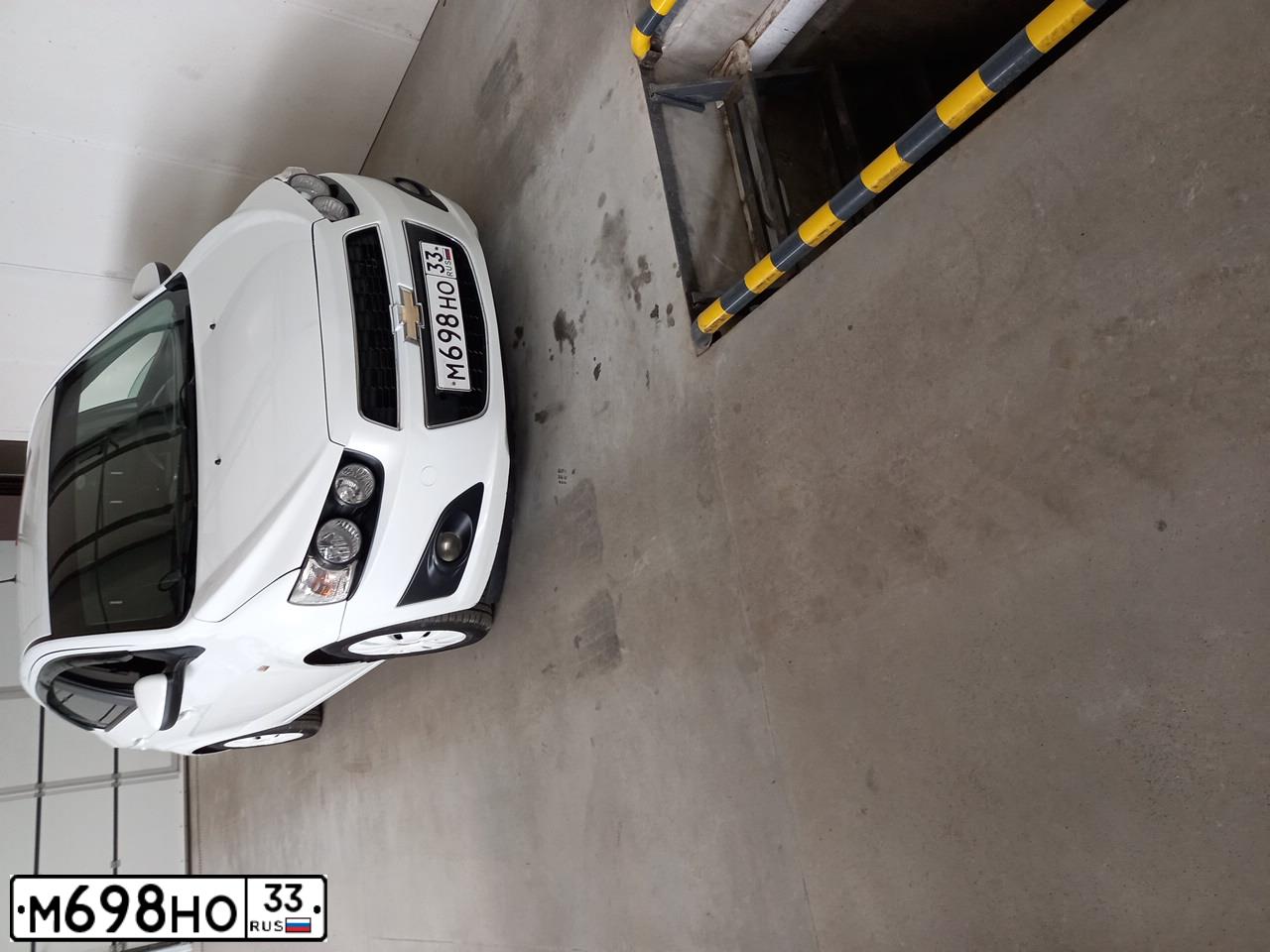 Фото автомобиля CHEVROLET AVEO, 2012 — госномер М698НО33. Цвет: Белый