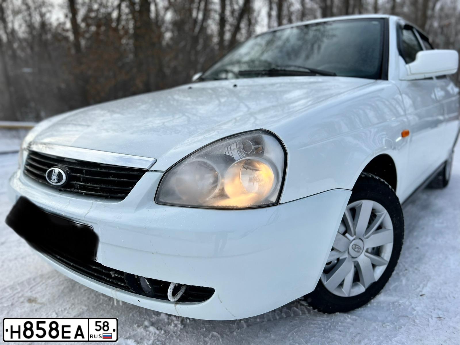 Фото автомобиля LADA PRIORA, 2011 — госномер Н686МН136. Цвет: Белый