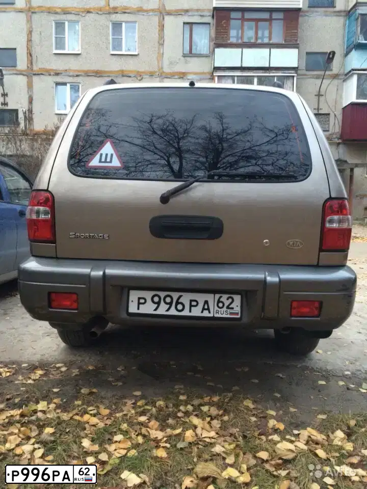 Фото автомобиля KIA SPORTAGE, 2005 — госномер Р996РА62. Цвет: Коричневый