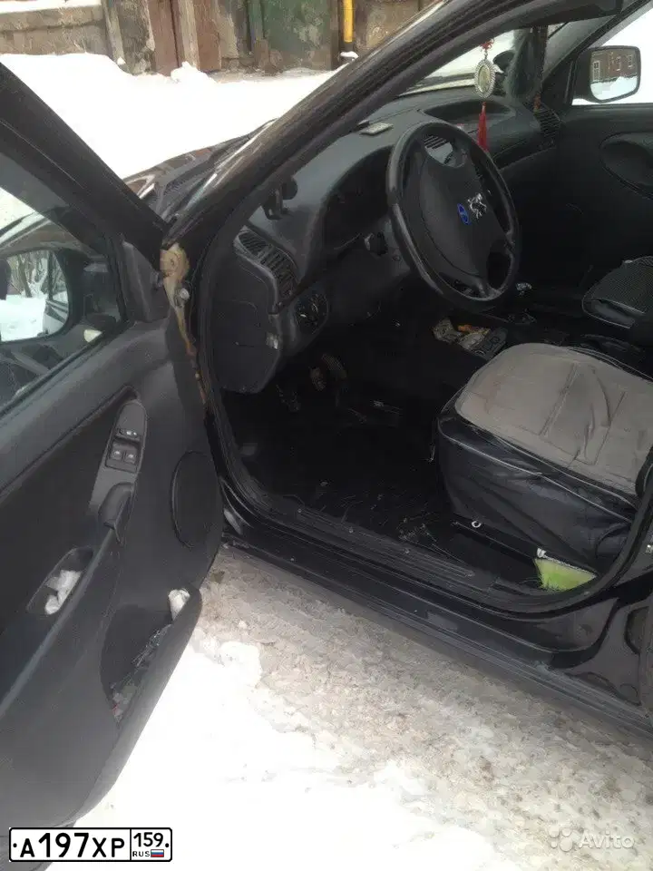 Фото автомобиля LADA 1117 KALINA, 2012 — госномер А197ХР159. Цвет: Сине-Черный