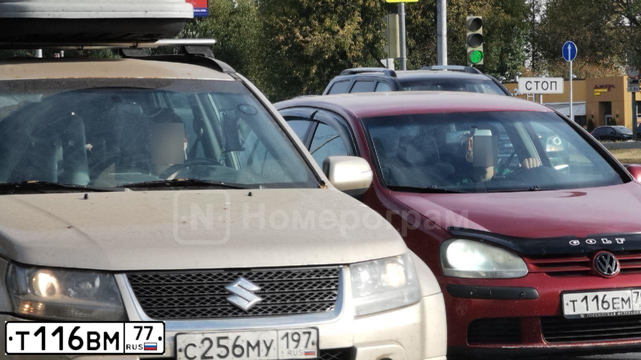 Фото автомобиля KIA CERATO, 2011 — госномер К121ОМ190. Цвет: Оранжевый