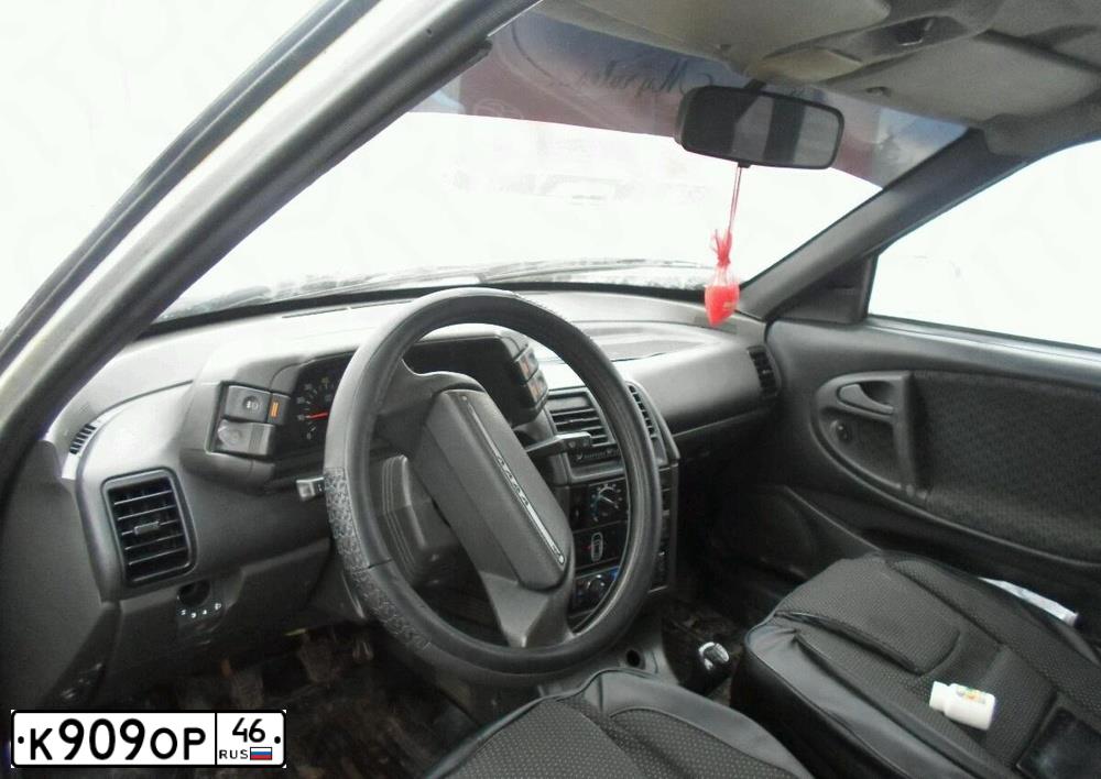 Фото автомобиля LADA 2112, 2002 — госномер К909ОР46. Цвет: Серебристый