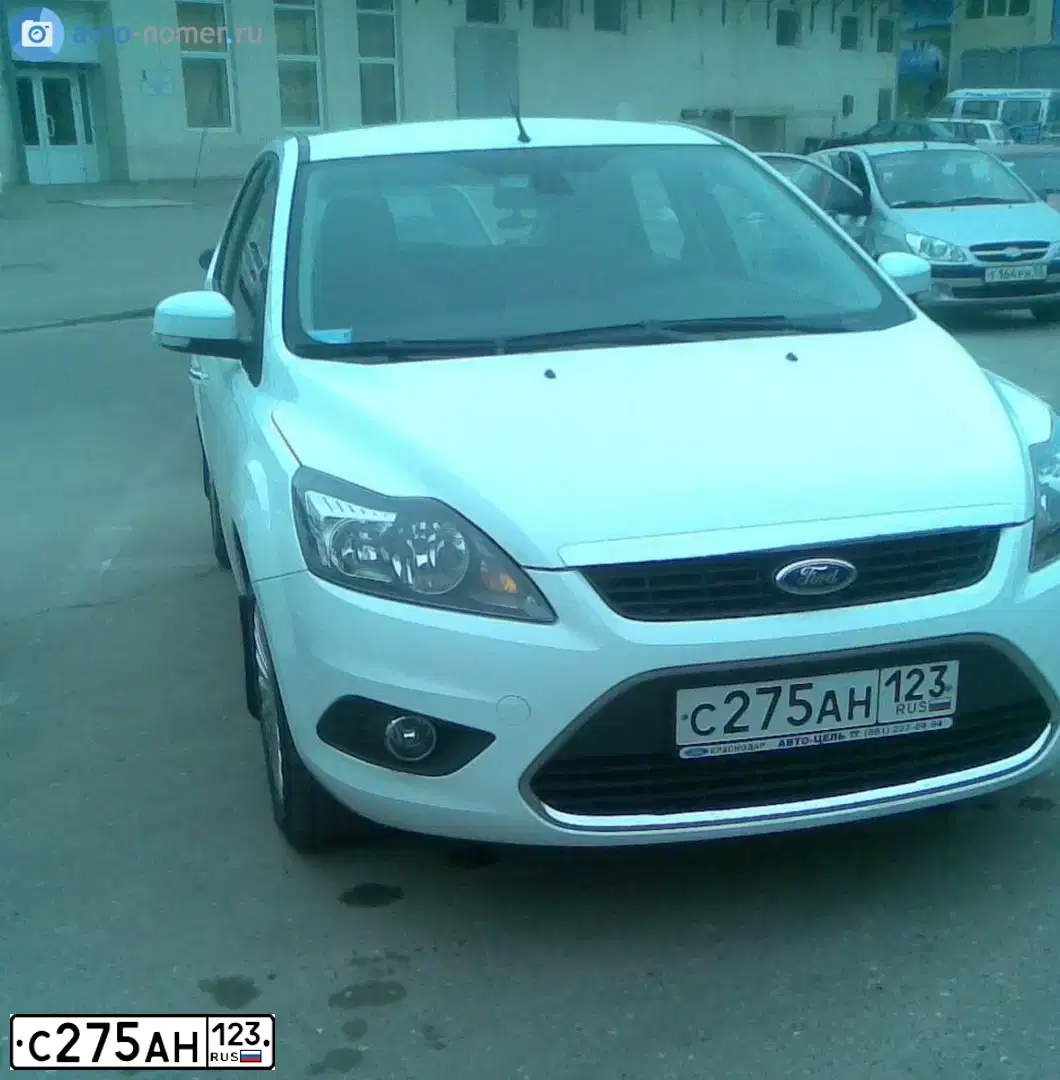 Фото автомобиля ФОРД ФОКУС, 2008 — госномер Х478НТ52. Цвет: КРАСНО-ОРАНЖЕВЫЙ