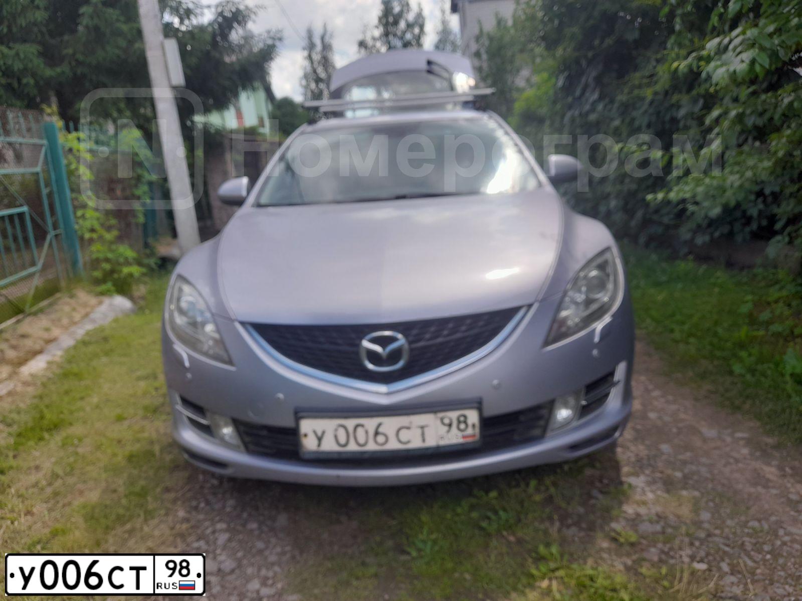 Фото автомобиля MAZDA 6, 2008 — госномер У006СТ98. Цвет: СЕРО-СИРЕНЕВЫЙ