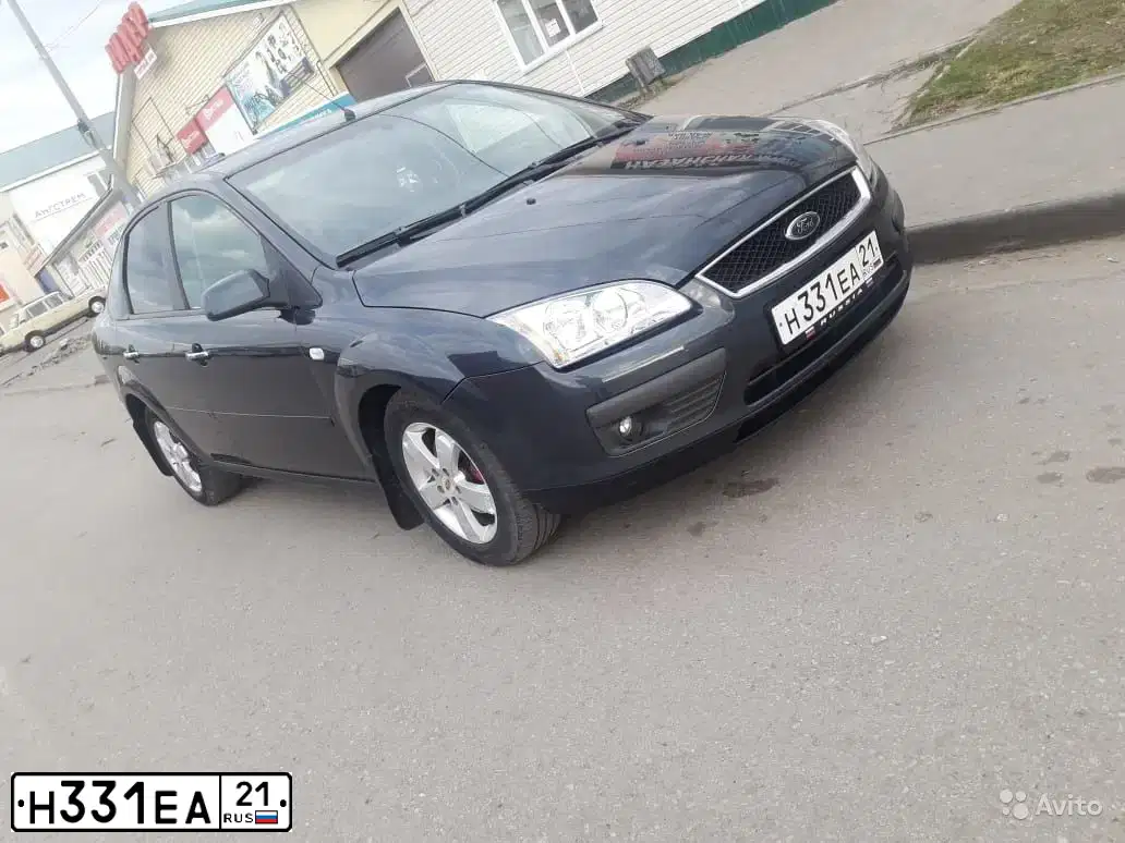 Фото автомобиля FORD FOCUS, 2007 — госномер К778ТК21. Цвет: ТЕМНО-СЕРЫЙ