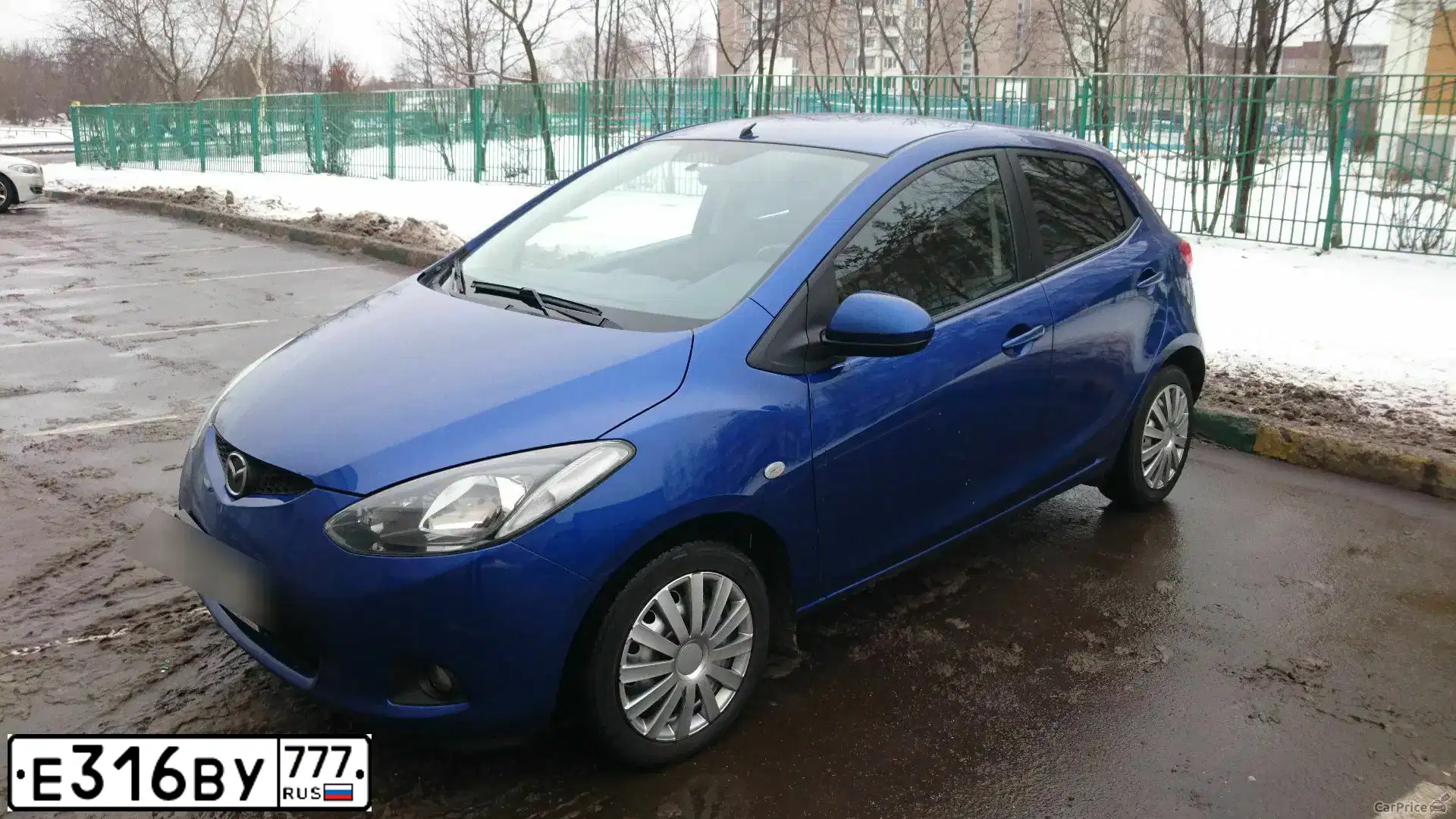 Фото автомобиля MAZDA 2, 2008 — госномер Е212ВВ82. Цвет: синий