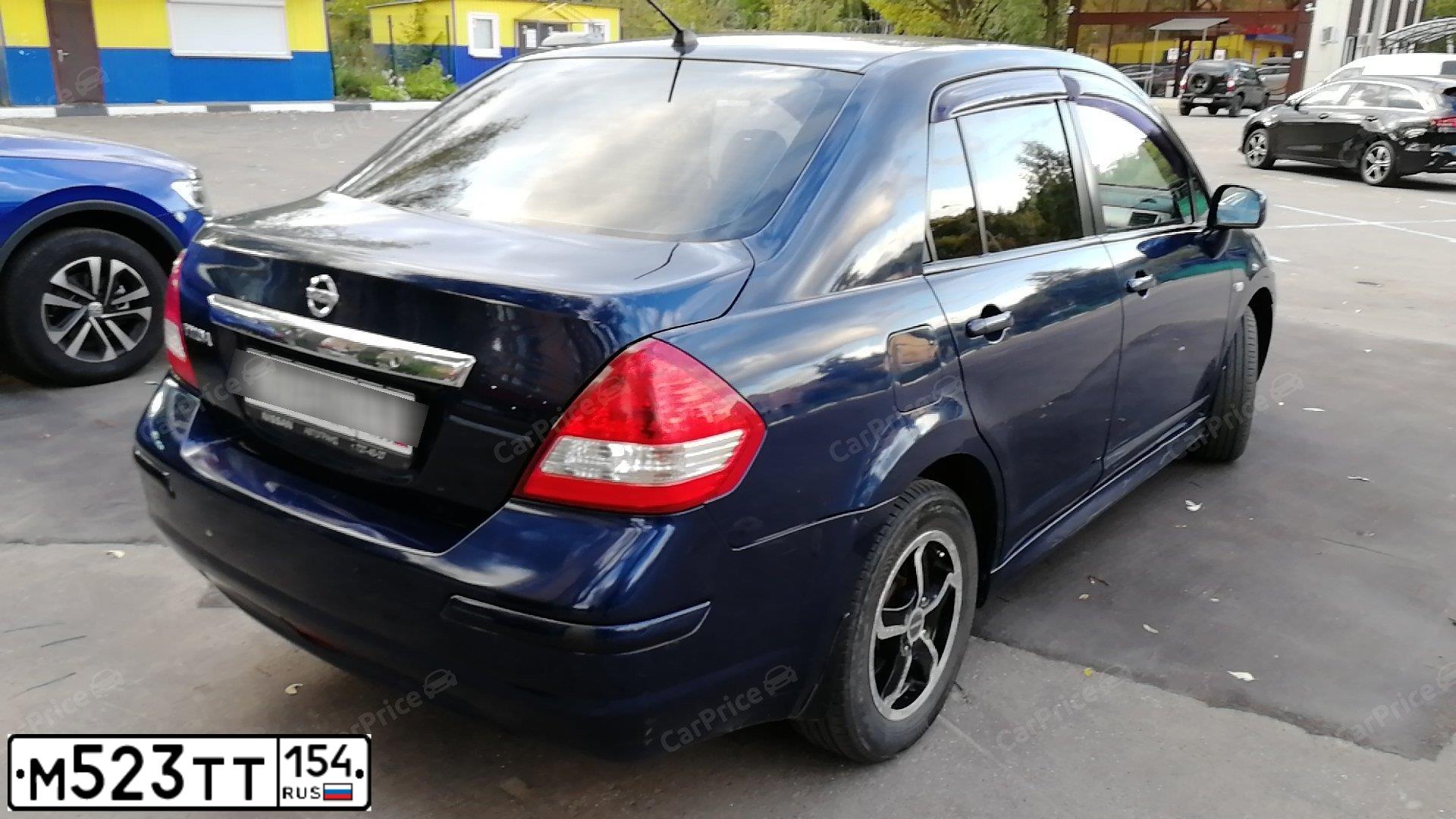 Фото автомобиля NISSAN TIIDA, 2011 — госномер У013ММ199. Цвет: Темно-синий