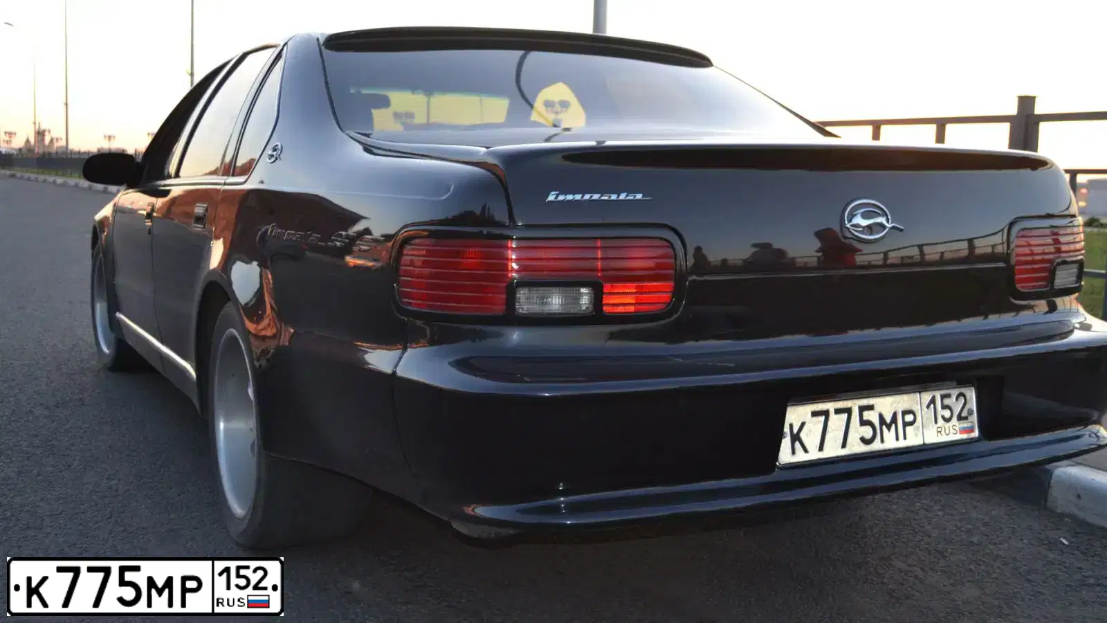Фото автомобиля CHEVROLET IMPALA, 1995 — госномер К775МР152. Цвет: ЧЕРНЫЙ