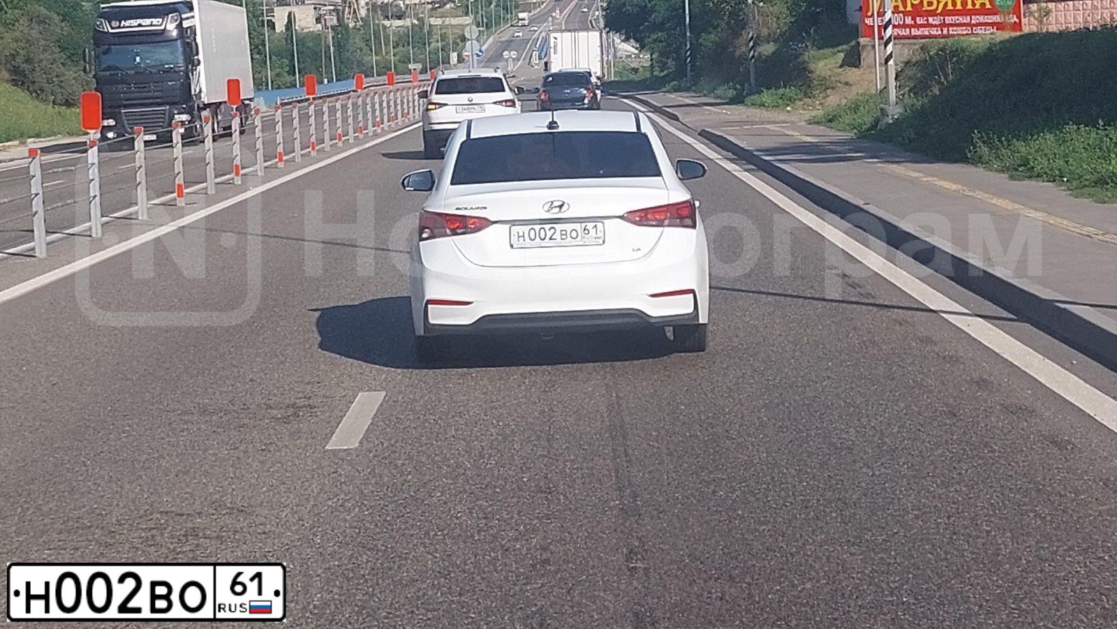 Фото автомобиля HYUNDAI SOLARIS, 2019 — госномер Н002ВО61. Цвет: БЕЛЫЙ