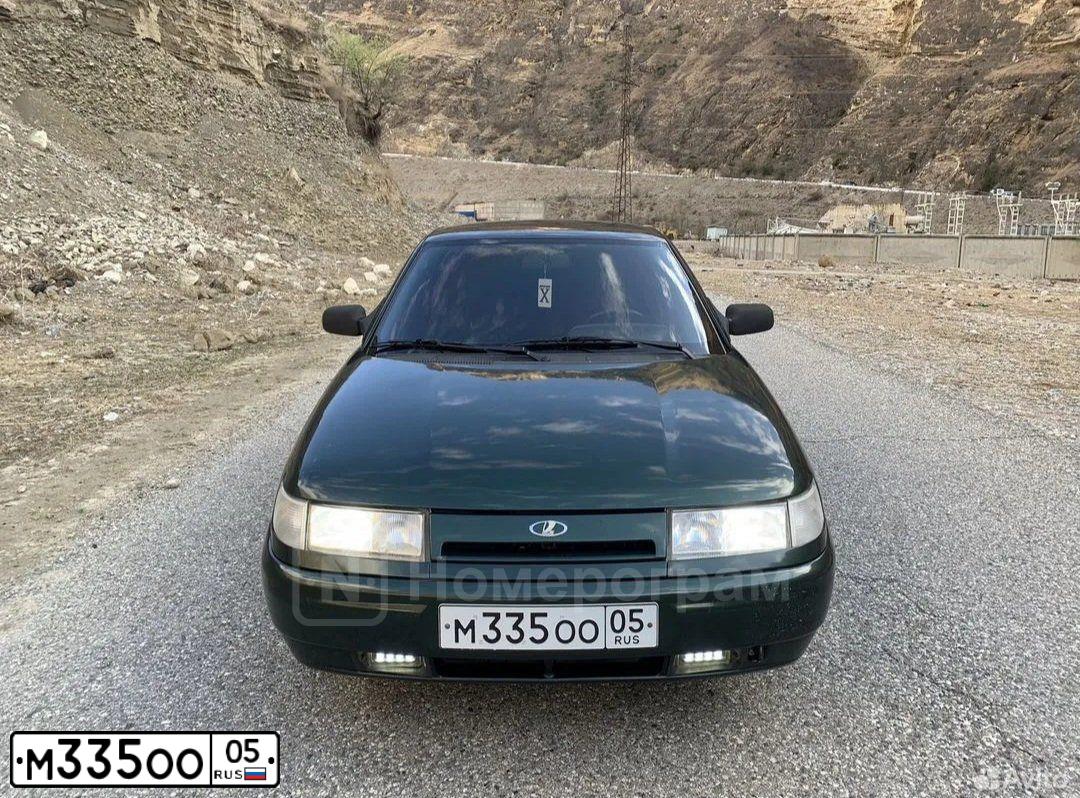 Фото автомобиля LADA 2110, 2003 — госномер М335ОО05. Цвет: Темно-зеленый