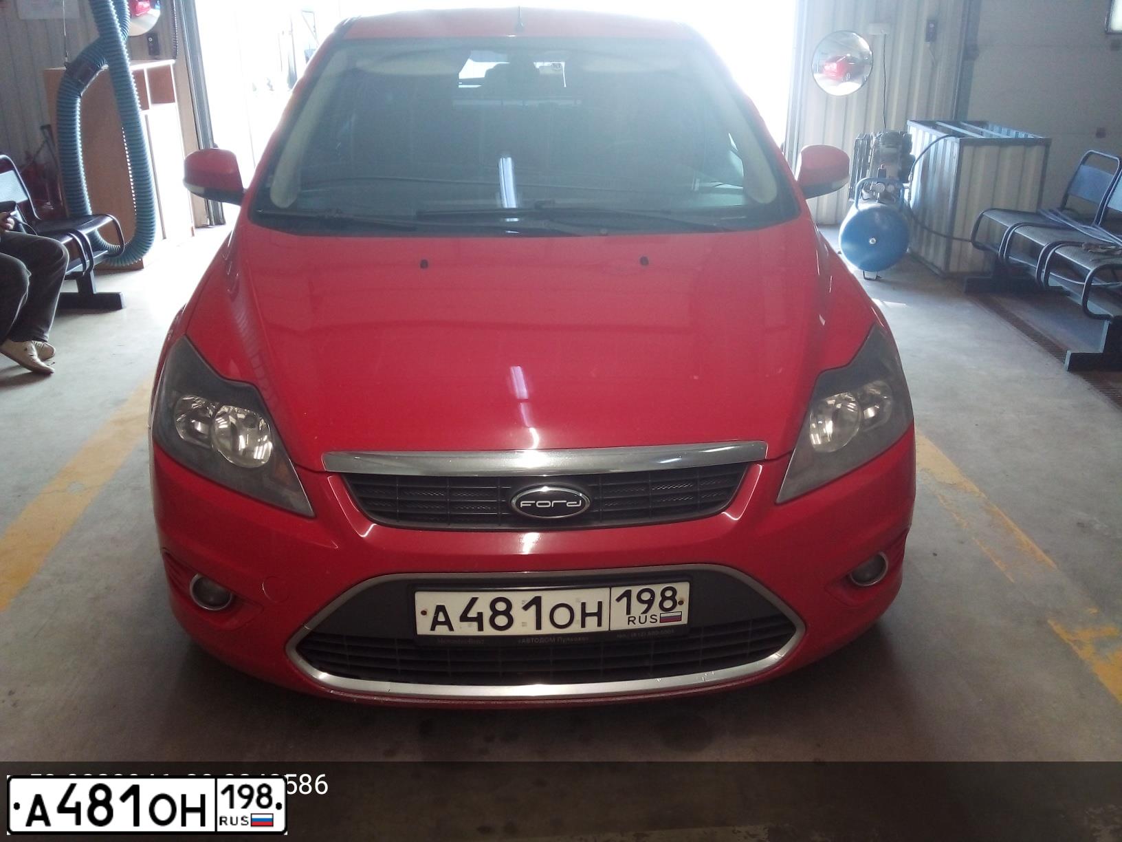 Фото автомобиля FORD FOCUS, 2011 — госномер К504СС53. Цвет: Красный