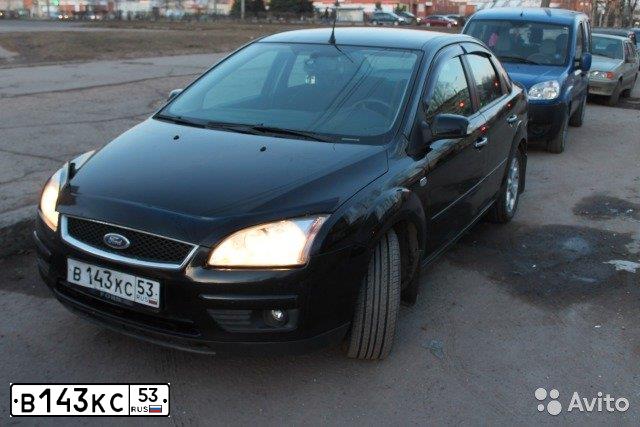 Фото автомобиля FORD FOCUS, 2007 — госномер Е649КС198. Цвет: ЧЕРНЫЙ