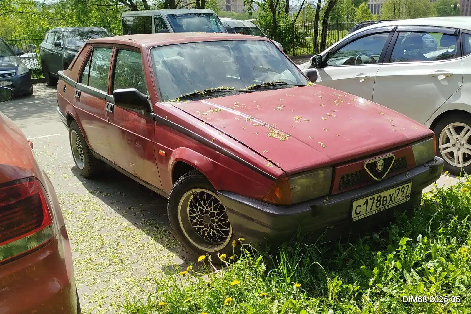Фото автомобиля ALFAROMEO ALFA 75, 1991 — госномер С178ВХ797. Цвет: Красный