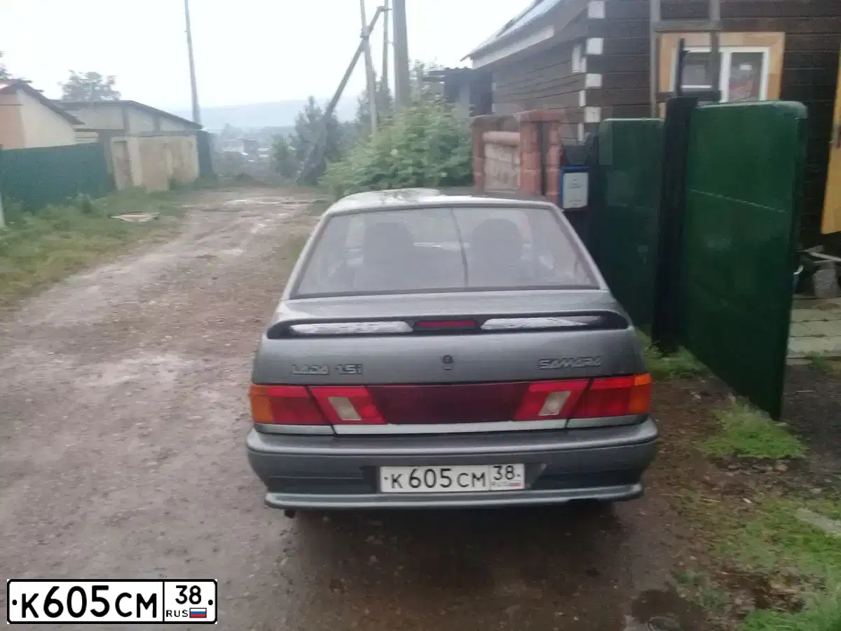 Фото автомобиля LADA 2115 SAMARA, 2004 — госномер Х222НВ38. Цвет: СЕРО-ЗЕЛЕНЫЙ