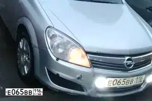 Фото автомобиля OPEL ASTRA, 2011 — госномер Т382МЕ73. Цвет: СЕРЕБРИСТЫЙ
