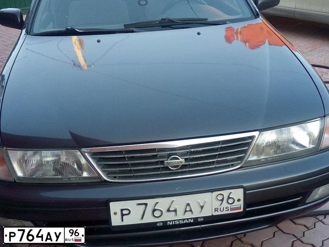 Фото автомобиля NISSAN SUNNY, 2004 — госномер Р764АУ96. Цвет: ЧЕРНЫЙ