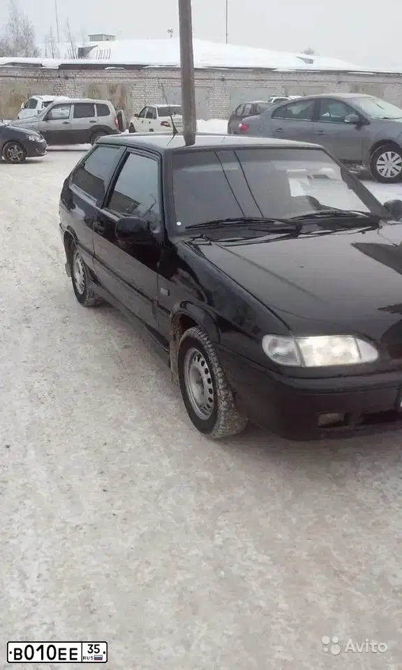 Фото автомобиля LADA 2113 SAMARA, 2010 — госномер Е999КВ35. Цвет: Сине-Черный