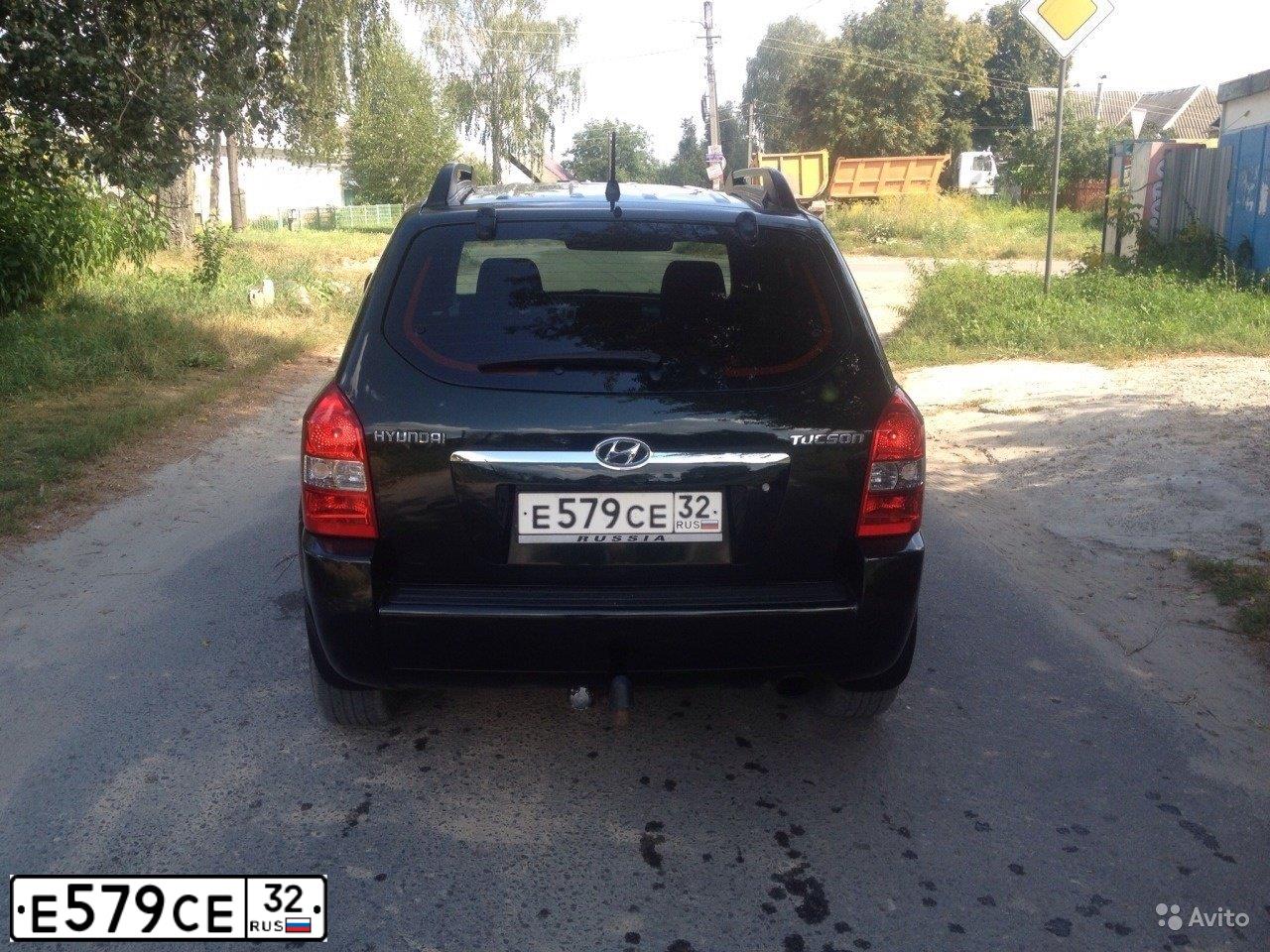 Фото автомобиля HYUNDAI TUCSON, 2007 — госномер Е579СЕ32. Цвет: Темно-зеленый