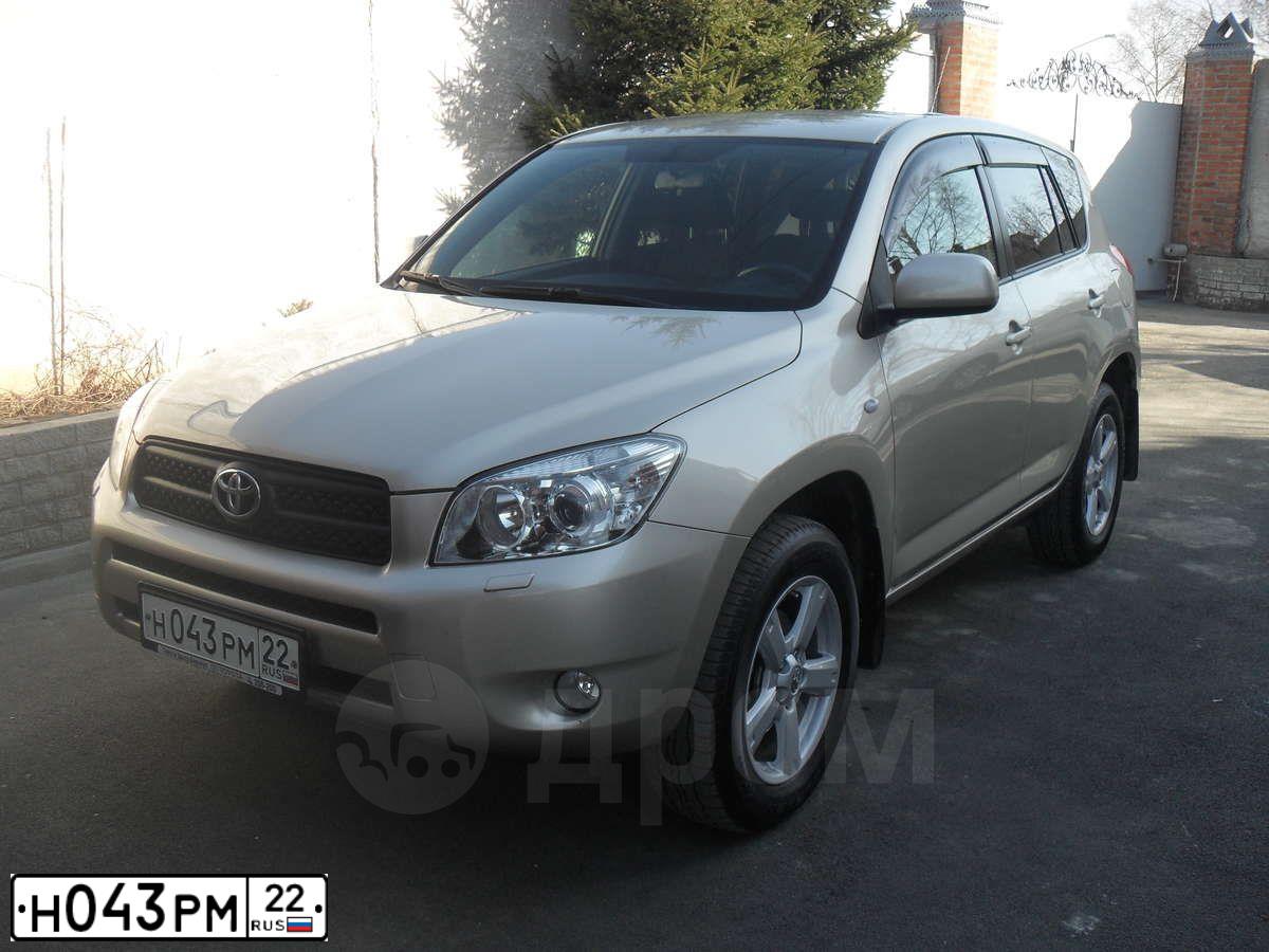 Фото автомобиля TOYOTA RAV4, 2008 — госномер Е700УА70. Цвет: БЕЖЕВЫЙ