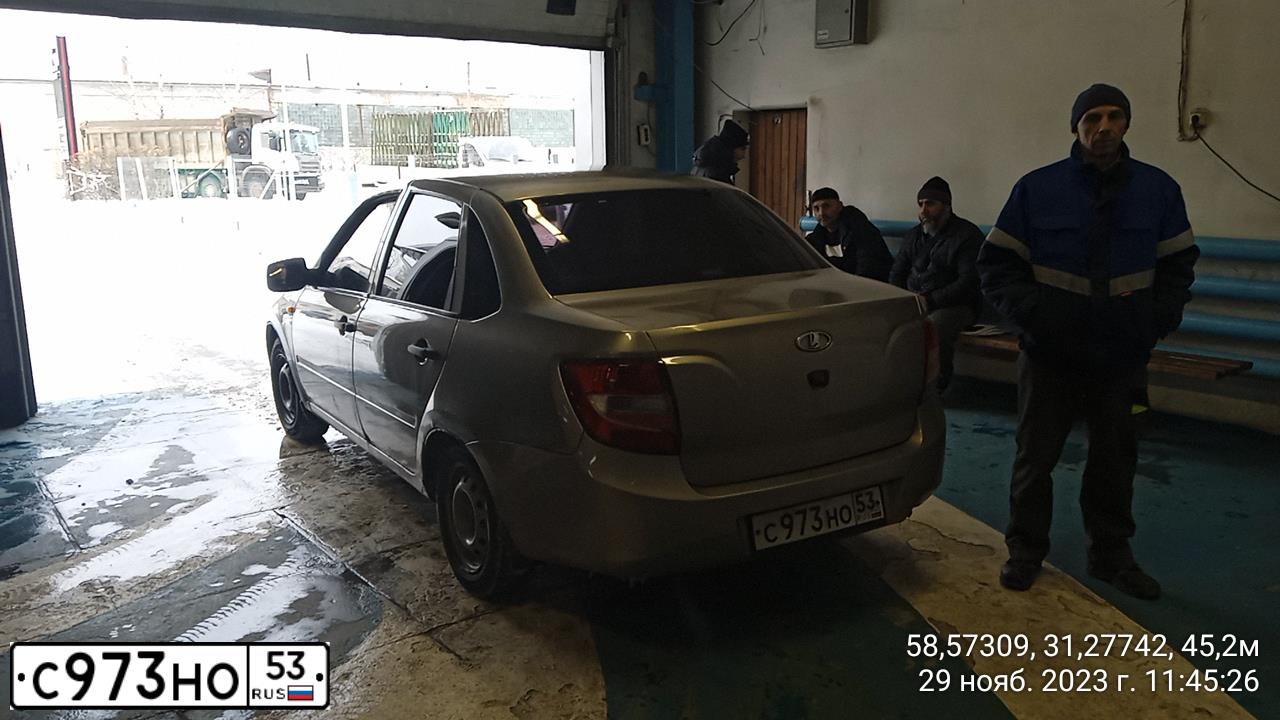 Фото автомобиля LADA 2190 GRANTA, 2012 — госномер С973НО53. Цвет: СЕРО-БЕЖЕВЫЙ