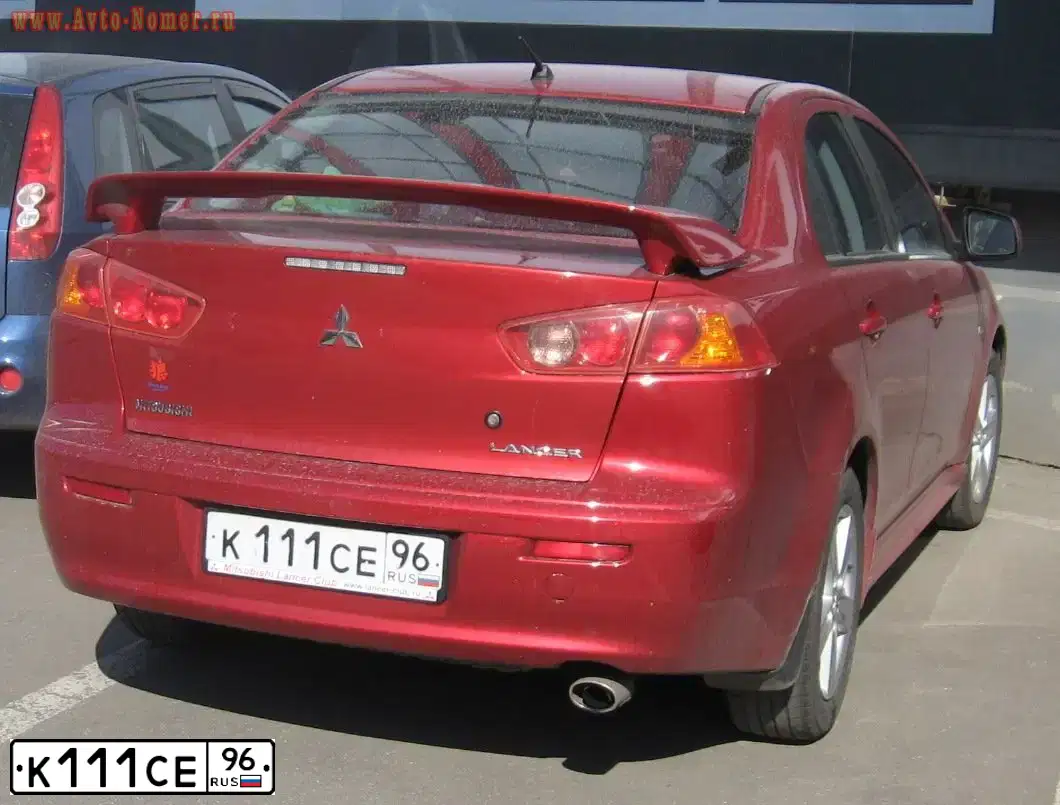 Фото автомобиля MITSUBISHI LANCER, 2007 — госномер Х338ВА196. Цвет: ЧЕРНО-БЕЛЫЙ