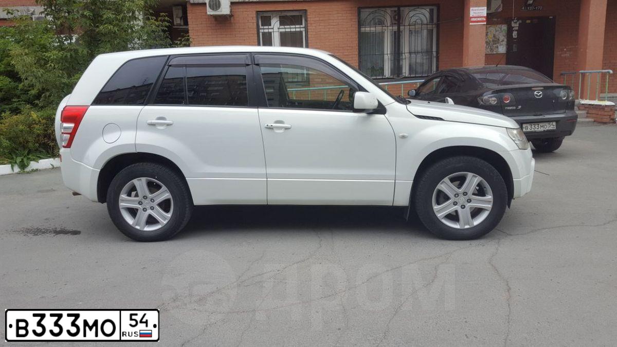 Фото автомобиля MAZDA 3, 2006 — госномер О706ХЕ154. Цвет: ЧЕРНЫЙ
