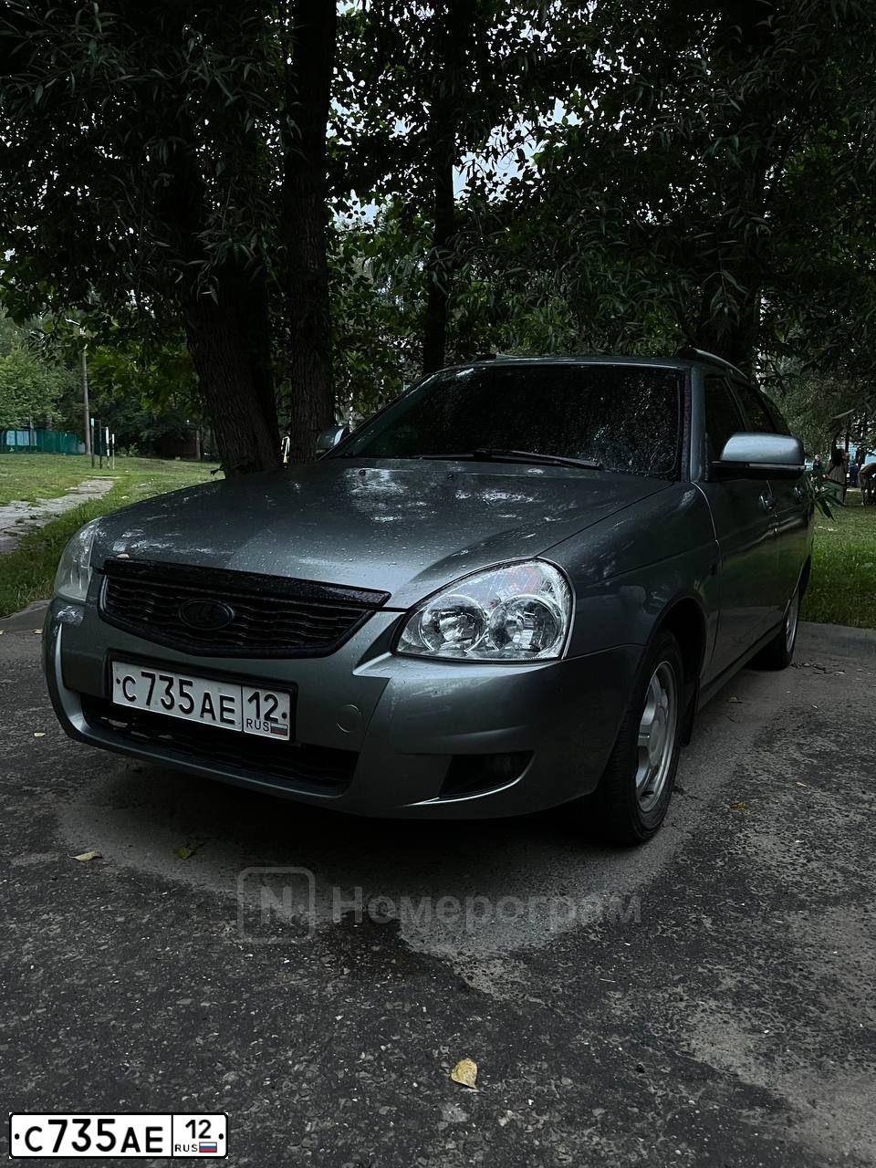 Фото автомобиля LADA 2171 PRIORA, 2011 — госномер С735АЕ12. Цвет: СРЕД.СЕРО-ЗЕЛЕН.МЕТ.