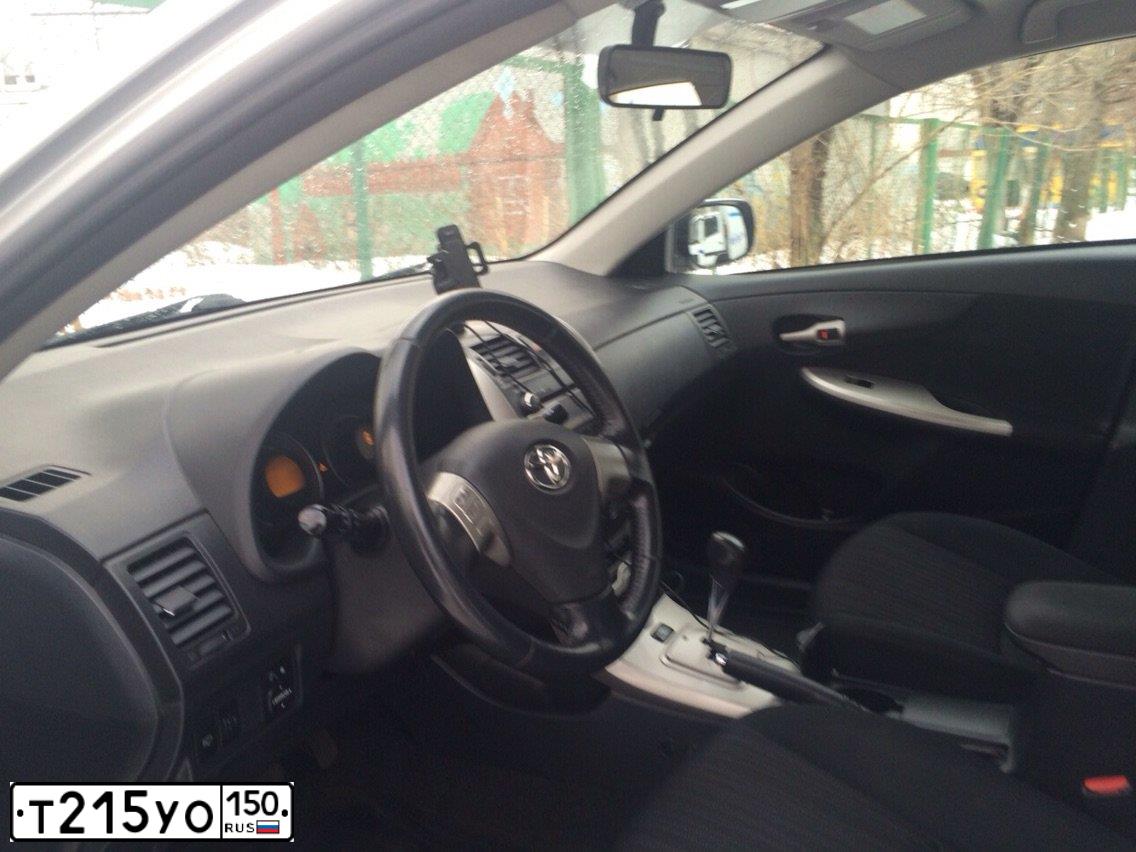 Фото автомобиля TOYOTA COROLLA, 2008 — госномер Т215УО150. Цвет: СЕРЕБРИСТЫЙ