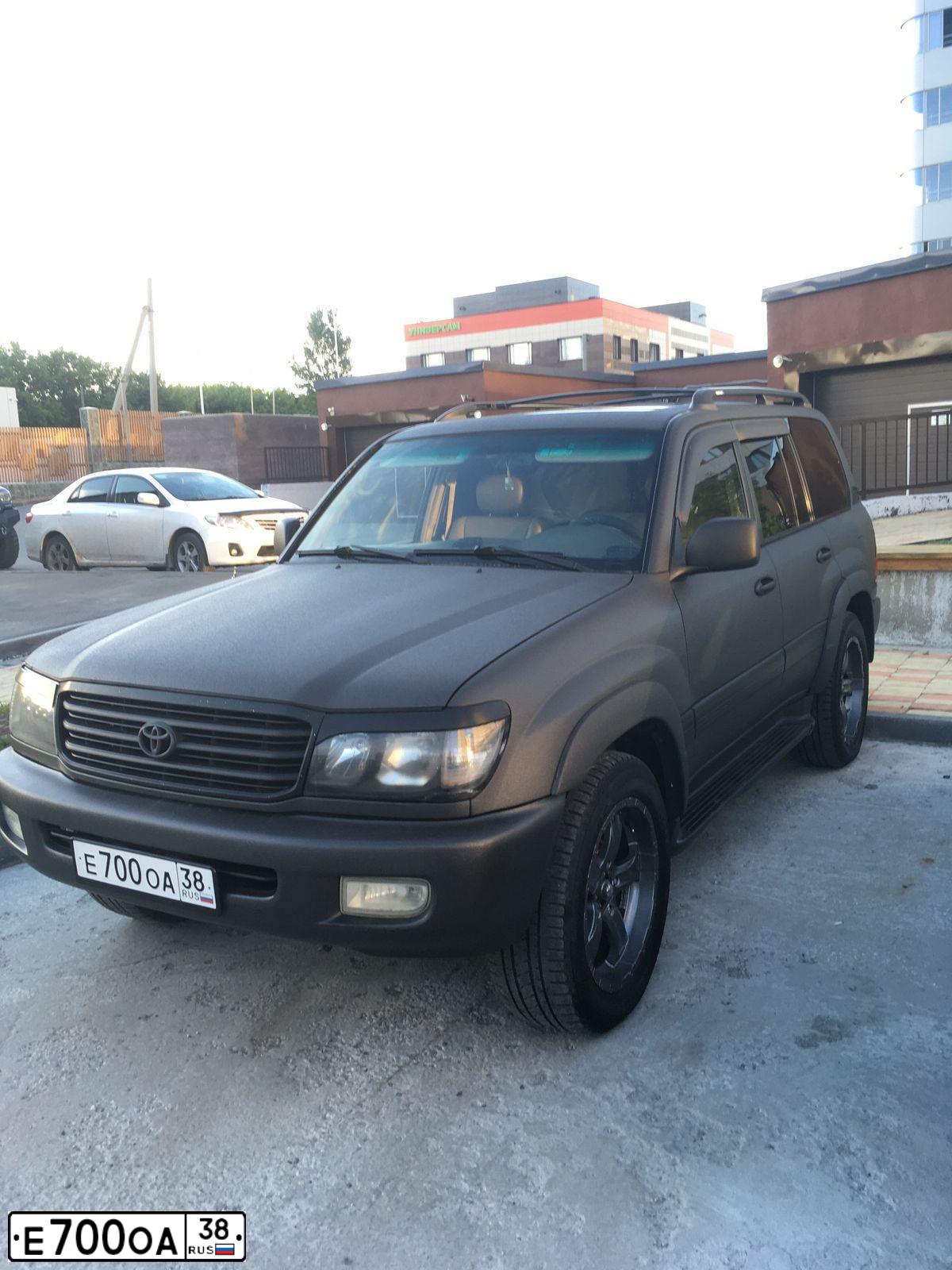 Фото автомобиля TOYOTA LANDCRUISER, 2000 — госномер Н320СО54. Цвет: ЧЕРНЫЙ