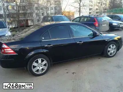 Фото автомобиля CHEVROLET AVEO, 2007 — госномер Н268ВМ199. Цвет: ЧЕРНЫЙ