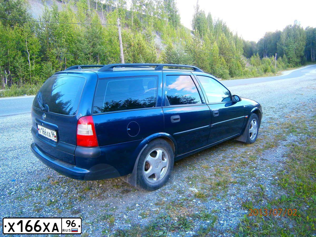 Фото автомобиля OPEL VECTRA, 1998 — госномер Р333СУ97. Цвет: СИНИЙ