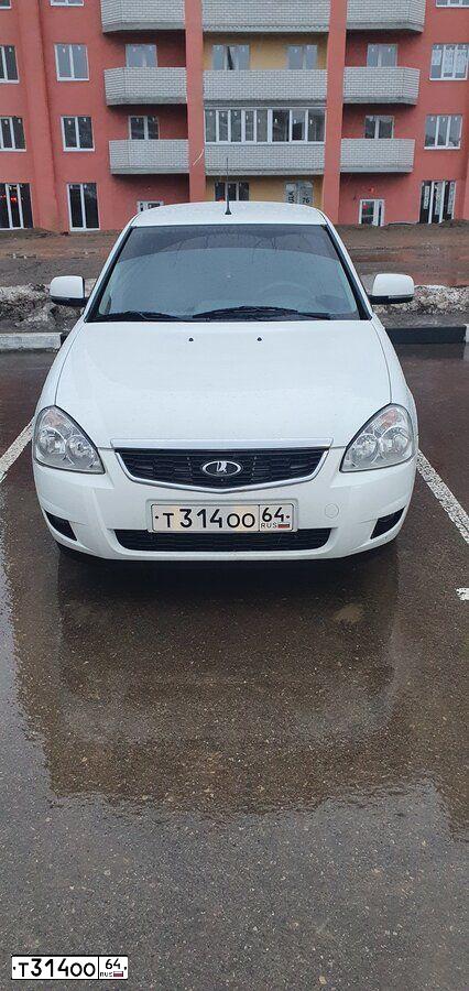 Фото автомобиля LADA 2170 PRIORA, 2015 — госномер Т314ОО64. Цвет: Белый