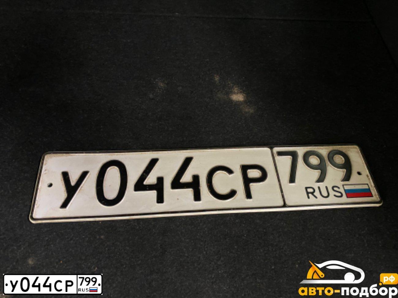 Фото автомобиля MITSUBISHI OUTLANDER, 2019 — госномер С071НН799. Цвет: Белый
