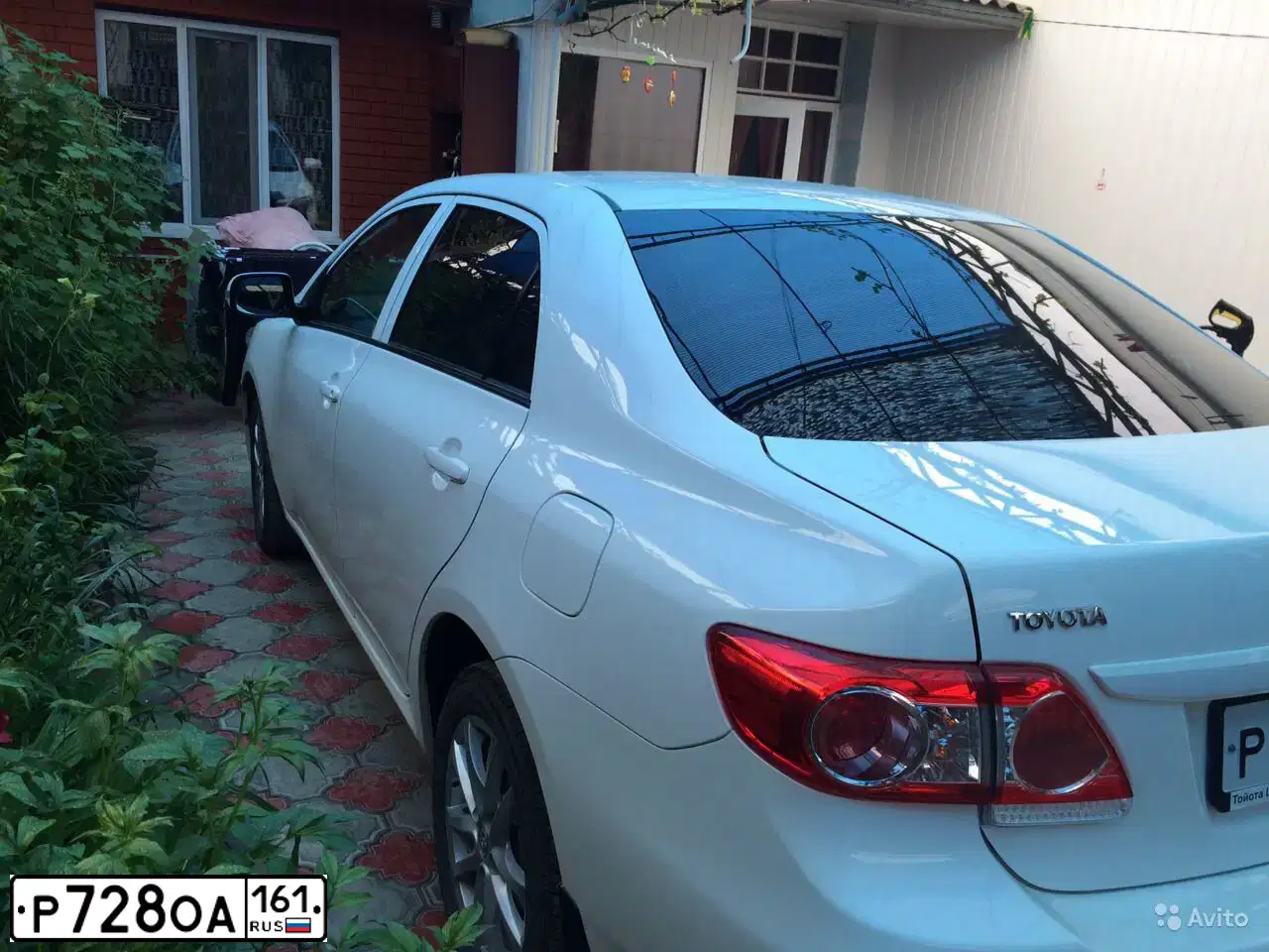 Фото автомобиля TOYOTA COROLLA, 2012 — госномер Х491НЕ05. Цвет: Белый