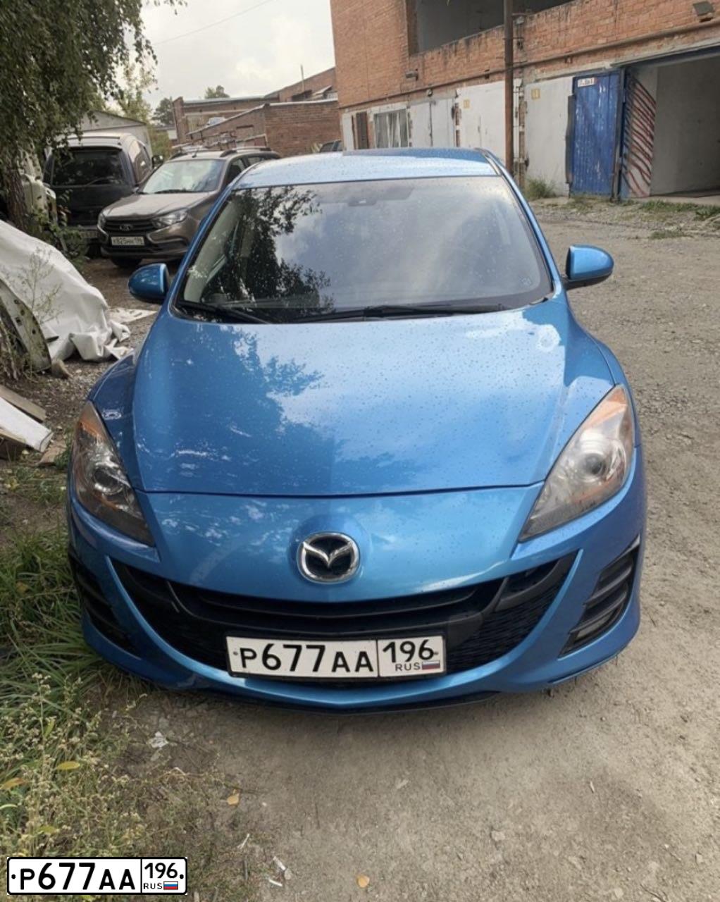 Фото автомобиля MAZDA A 3, 2011 — госномер С216ОХ196. Цвет: голубой