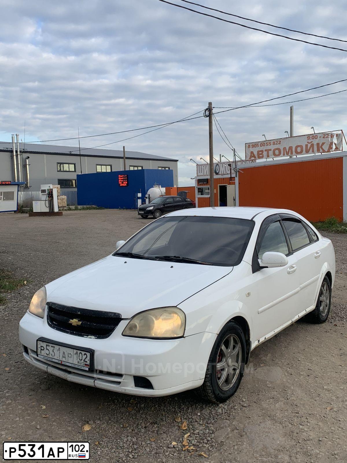 Фото автомобиля CHEVROLET LACETTI, 2006 — госномер М861КА702. Цвет: Белый