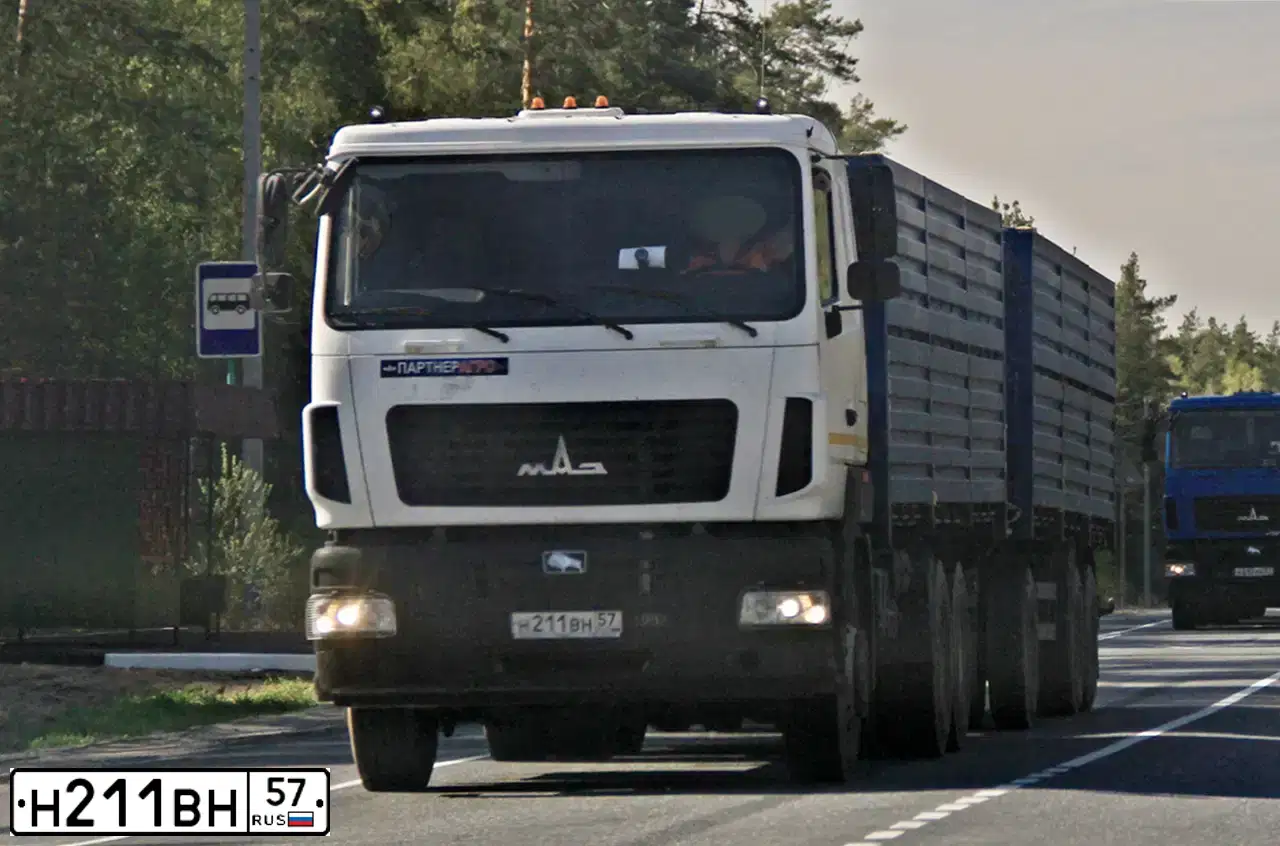 Фото автомобиля MAZ MAN MAZ-MAN 6312 6X4, 2015 — госномер Н211ВН57. Цвет: Белый