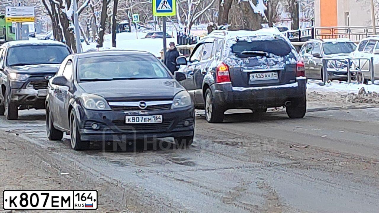 Фото автомобиля OPEL ASTRA, 2010 — госномер К807ЕМ164. Цвет: ЧЕРНЫЙ