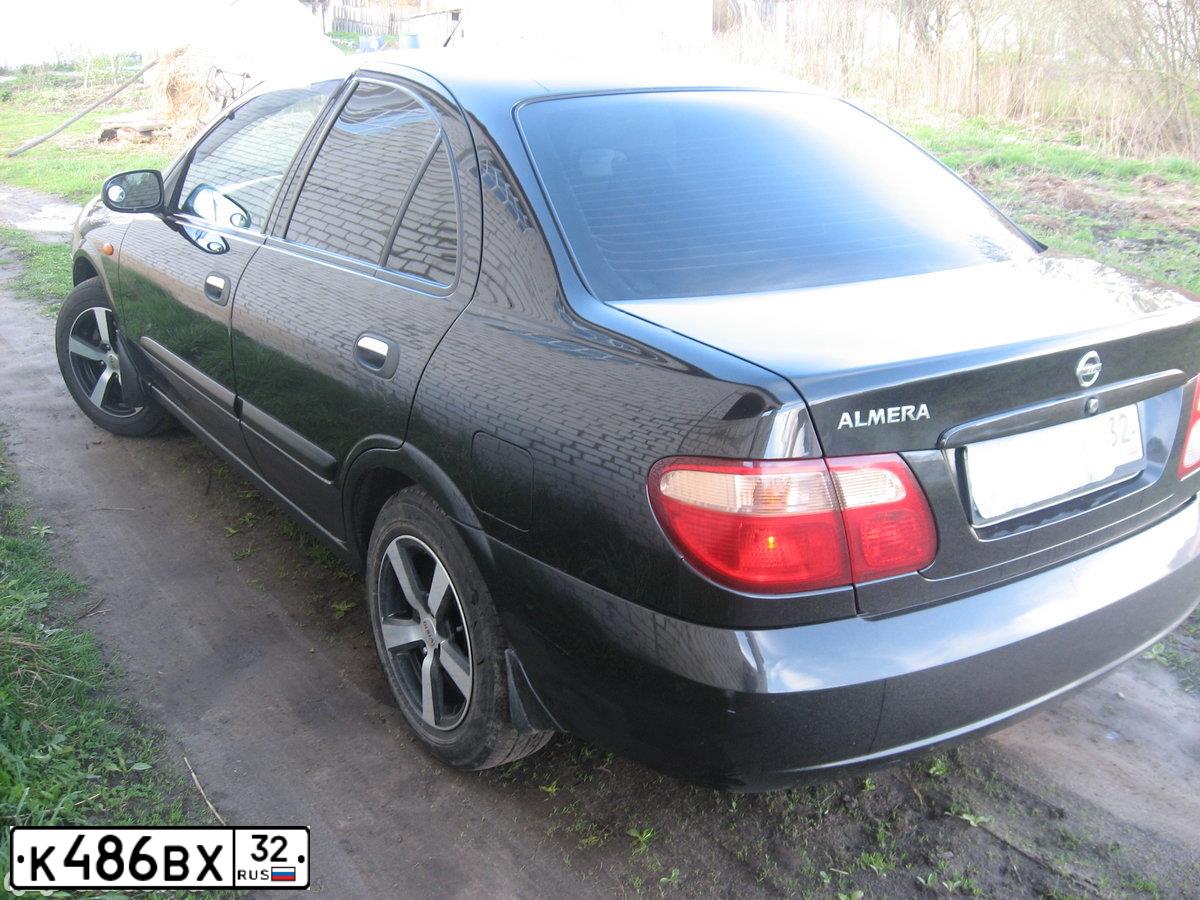 Фото автомобиля NISSAN ALMERA, 2005 — госномер К486ВХ32. Цвет: ЧЕРНЫЙ