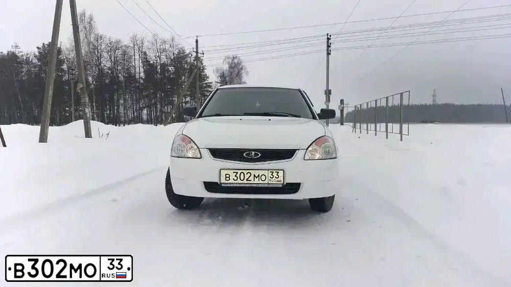 Фото автомобиля LADA 2170 PRIORA, 2010 — госномер В302МО33. Цвет: Белый