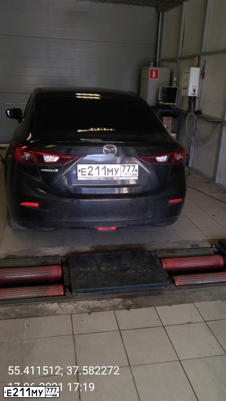 Фото автомобиля MAZDA 3, 2014 — госномер Е211МУ777. Цвет: ЧЕРНЫЙ