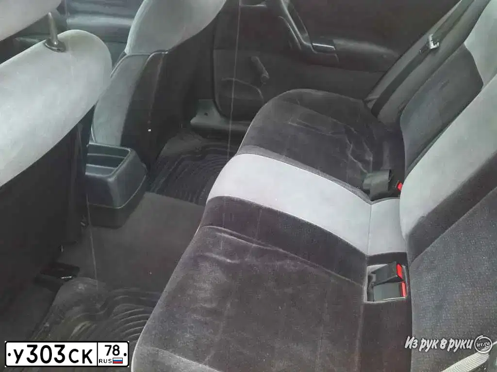 Фото автомобиля OPEL OMEGA, 1994 — госномер Н522АН198. Цвет: ВИШНЕВЫЙ