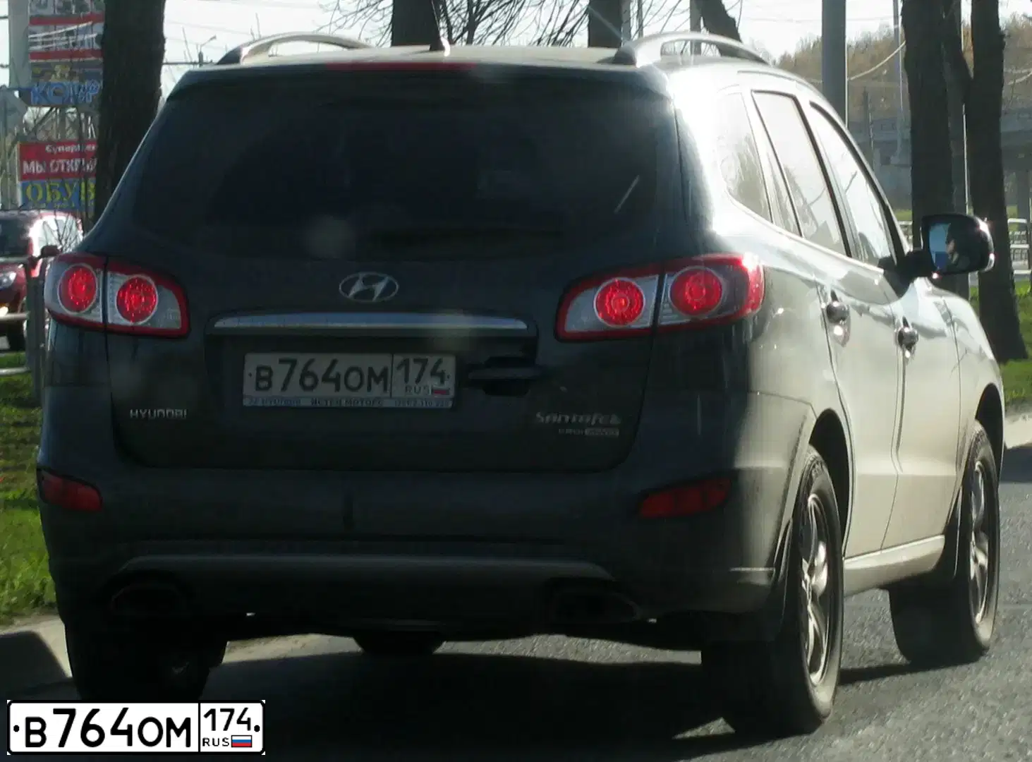Фото автомобиля HYUNDAI SANTA FE, 2012 — госномер Х255ТК55. Цвет: ТЕМНО СЕРЫЙ