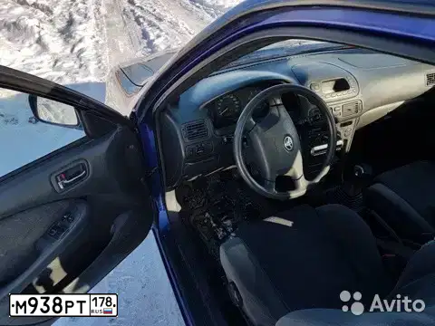 Фото автомобиля TOYOTA COROLLA, 2000 — госномер М109ВК98. Цвет: синий
